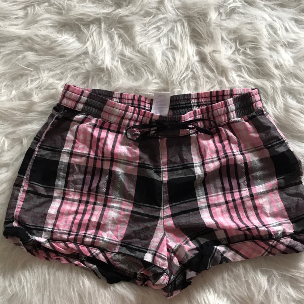 Pink and black plaid shorts